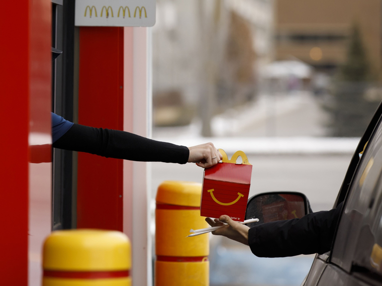 McDonald’s shuts dining areas at company-owned locations and encourages franchises to follow suit