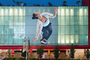 Giant sticker of a dancing woman on an Apple Store's windows