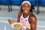 Coco Gauff with a plate of Barilla chickpea orzo.